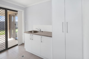 over 55 homes laundry area